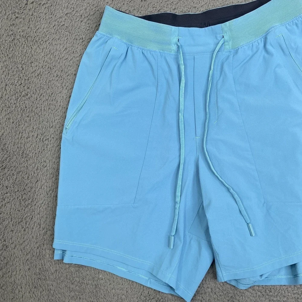 Lululemon License To Train LTT Shorts Mens Small Light Blue Zip Pockets Drawcord